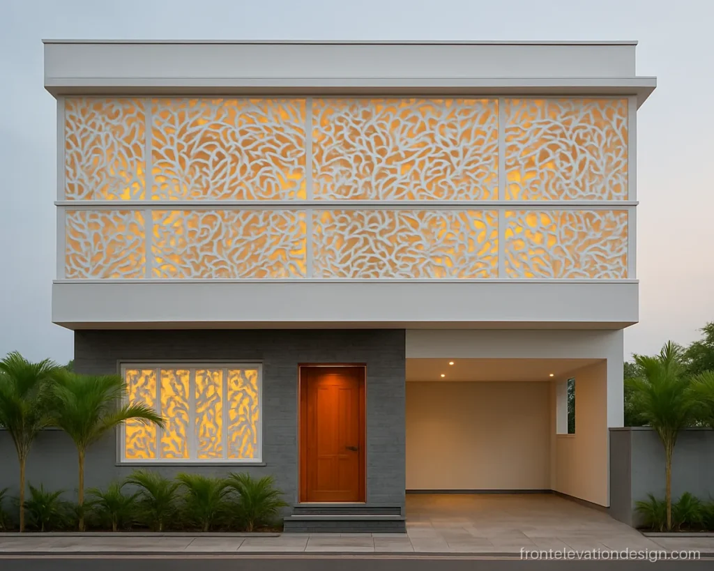 Front elevation GRC jali panels in white covering the upper floor of a G+2 house