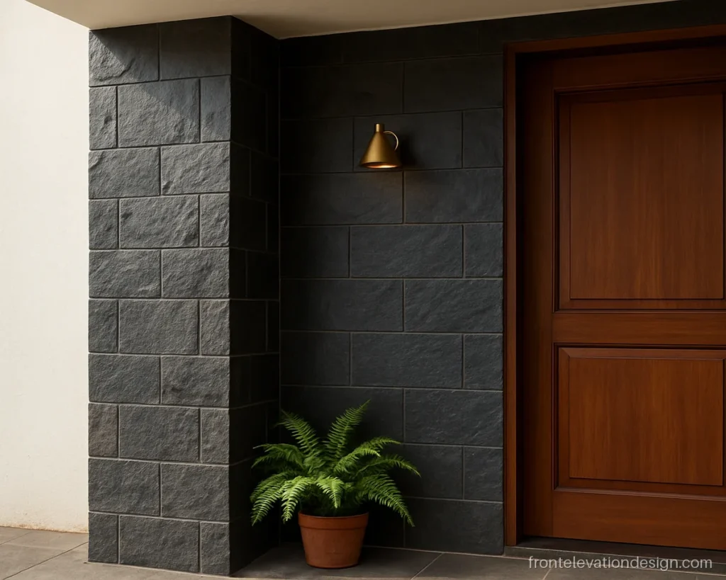 Close-up of front elevation stone design with black slate tiles on an entry pillar